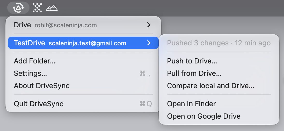 The DriveSync menu open, listing two folders with their Google accounts, and a submenu with push, pull and compare.