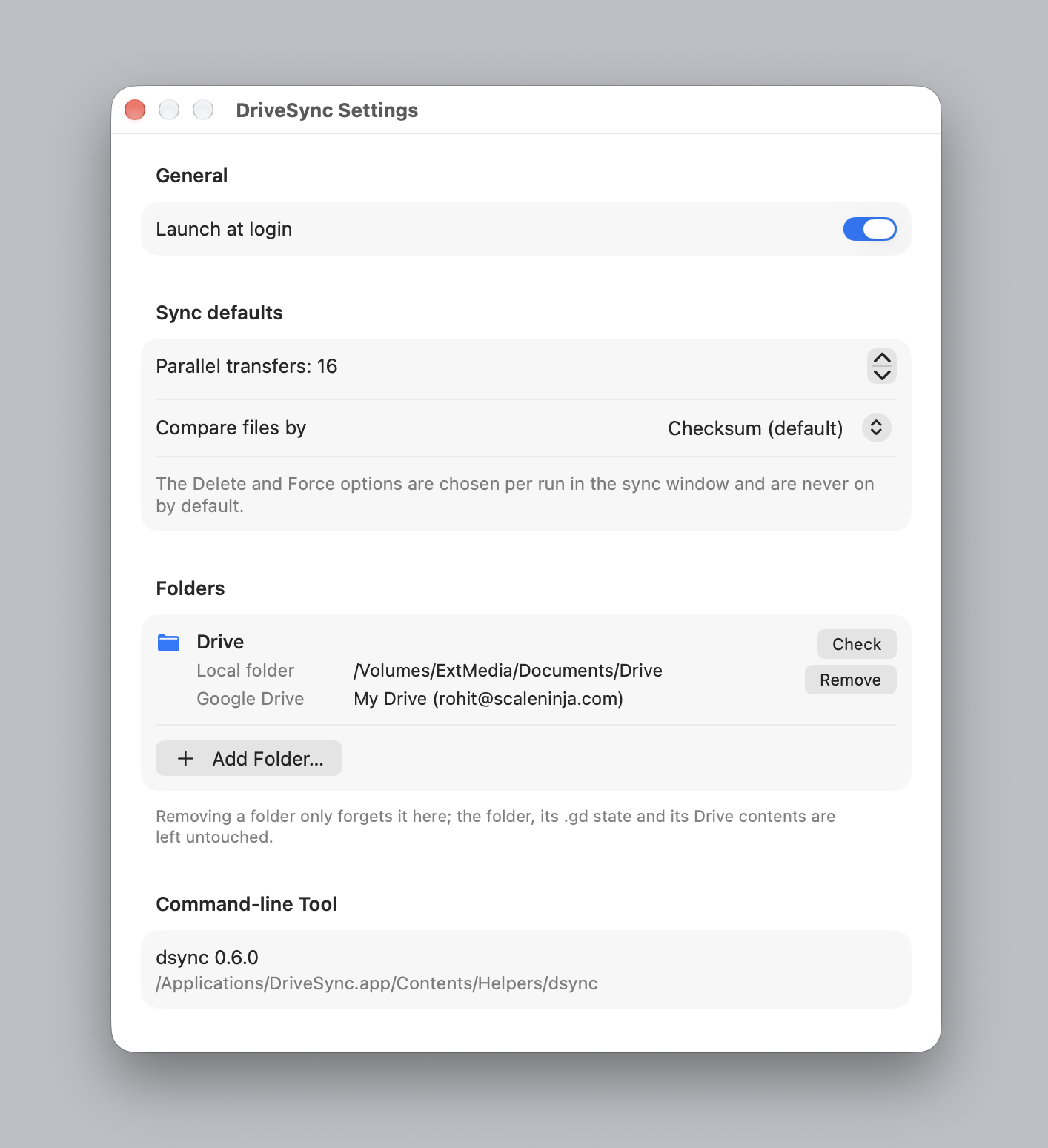 DriveSync Settings showing launch at login, sync defaults, the folder list with check and remove buttons, and the bundled dsync version.